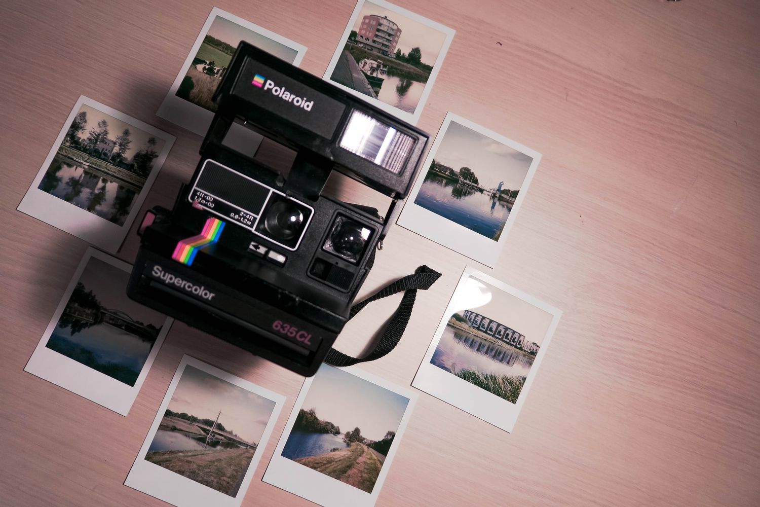 1 black-polaroid-instant-camera-surrounded-by-film